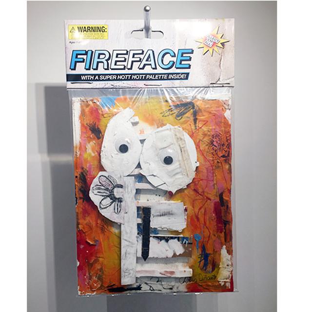 Fireface, 2018, 40" x 60", 2018 Mixed media comprised of oil, spray-paint, pastel and acrylic paint on insulation foam, cardboard, paper and canvas encased in polystyrene plastic, with archival inkjet print and armature wire with conduit pipe. In verso: inkjet print on foam board.