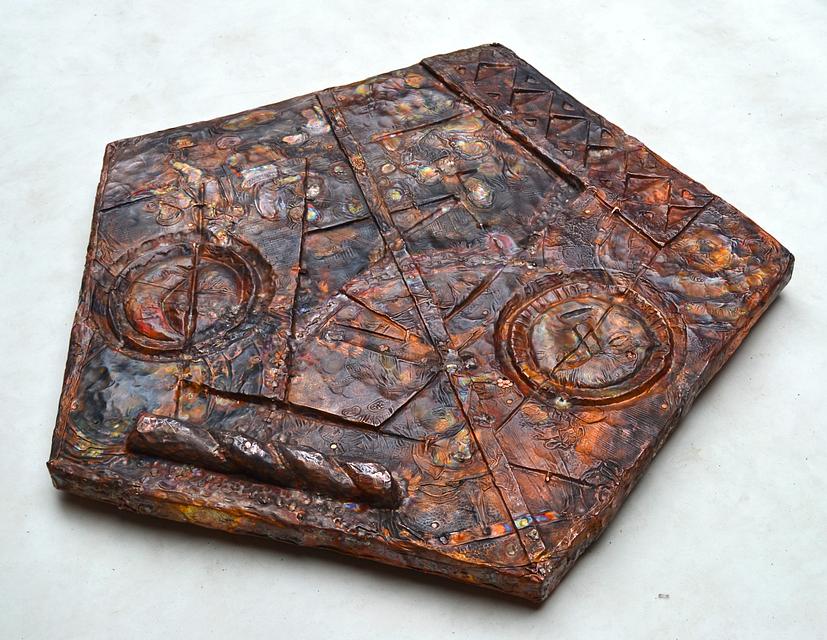 2017, hand carved wood and hammered copper plates, 38 × 38 × 2 in